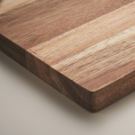 Tagliere rettangolare in legno di acacia con affilalame su un angolo color legno quinta vista fotografica