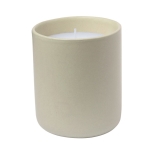 Candela profumata alla vaniglia in elegante vasetto di ceramica color naturale prima vista