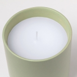 Candela profumata alla vaniglia in elegante vasetto di ceramica seconda vista
