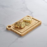 Tagliere in bambù con maniglia angolare per servire color naturale vista ambiente
