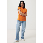 Polo piqué in cotone riciclato donna casual fit M da 220 g/m2 Iqoniq color arancione vista con modello