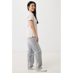 Polo piqué in cotone riciclato donna casual fit M da 220 g/m2 Iqoniq color rosa chiaro terza vista con modello