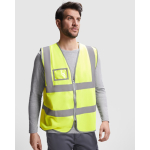 Gilet alta visibilità con tasca e cerniera in poliestere Roly Polux color giallo fluorescente prima vista d'uso