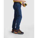 Pantaloni lavoro in denim di cotone e poliestere 370g/m2 Roly Raptor 36 color blu alice terza vista d'uso