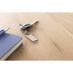 Memoria USB piccola in zinco su misura con dettaglio rotondo color argento
