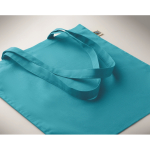 Shopper con manici lunghi in cotone colorato 180 g/m² Fairtrade color turchese quarta vista fotografica