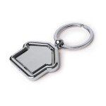 Portachiavi metallico girevole a forma di casa con ampia area di marcatura color argento prima vista d'uso