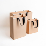 Borsa di carta premium con finitura opaca e manici in tessuto resistente 7kg vue 1