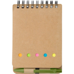 Blocco note in cartone con spirale, penna e fogli a righe color verde chiaro prima vista