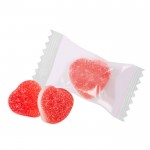 Caramelle gommose zuccherate panna e fragola a forma di cuore color fragola seconda vista