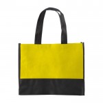 Shopper bicolore con soffietto in tnt da 80 gr/m² color giallo prima vista