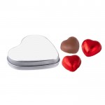Scatola di cioccolatini al latte a forma di cuore color argento seconda vista