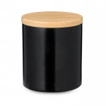 Candela alla vaniglia in barattolino metallico con coperchio in bambù color nero prima vista