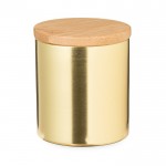 Candela alla vaniglia in barattolino metallico con coperchio in bambù color oro prima vista