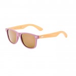 Occhiali da sole con stanghette di bambù e lenti AC colorate UV400 color rosa prima vista
