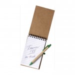 Piccolo block notes verticale con penna color verde seconda vista