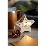 Decorazione natalizia a forma di stella in legno MD con luce color legno vista ambiente principale