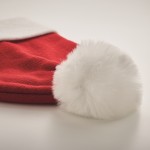 Cappello natalizio lavorato a maglia in poliestere PET con pompon color rosso vista fotografica