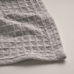 Coperta in cotone leggero da 300 gr/m² con trama a waffle color grigio quarta vista fotografica