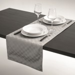 Runner da tavola in poliestere 185 gr/m² con finitura idrorepellente color grigio vista fotografica