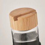Borraccia in vetro con tappo in bambù con supporto per smartphone color nero vista fotografica