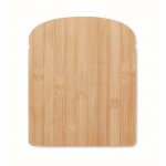 Tagliere a forma di panbauletto in bambù con scanalatura sul bordo color legno quarta vista