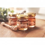 Barattolini con 3 sapori di miele differenti color legno vista ambiente principale