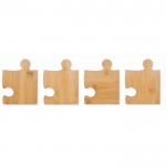 Quattro sottobicchieri in bambù a forma di puzzle color legno sesta vista