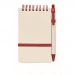 Mini block notes con spirale superiore e penna abbinata color rosso prima vista