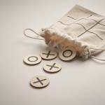 Gioco del tris in legno con tessere rotonde in sacchetto di cotone quinta vista fotografica
