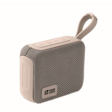 Piccolo altoparlante wireless con manico coordinato per il trasporto