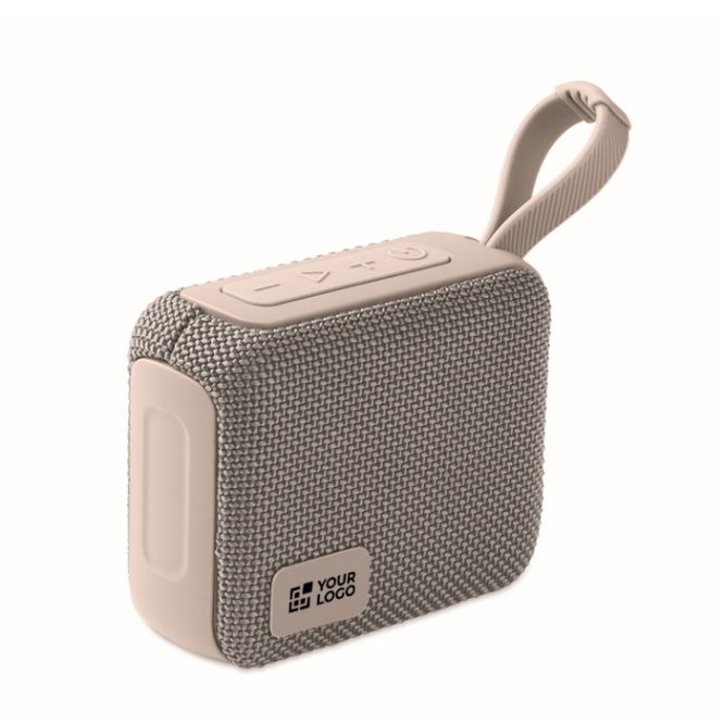 Piccolo altoparlante wireless con manico coordinato per il trasporto